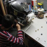 Children taking apart a printer