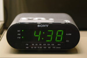 Newer, Sony digital alarm clock showing 4:38 pm