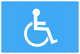 The standard disability icon of a person in a wheelchair on a blue background.